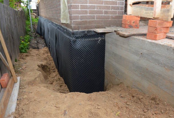 SJ Waterproofing Pros technician performing targeted Basement Waterproofing assessment in Jonesborough, TN